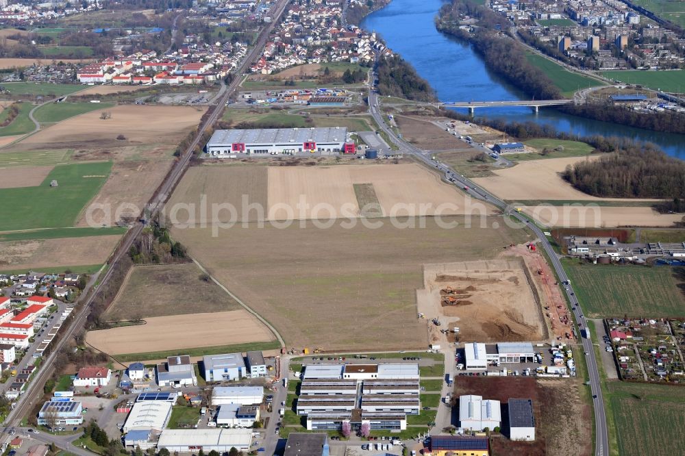 Aerial photograph Rheinfelden (Baden) - Earthworks in the industrial area for the company administration building of the Pharmaceutical Company Fisher Clinical Services in the district Herten in Rheinfelden (Baden) in the state Baden-Wurttemberg, Germany