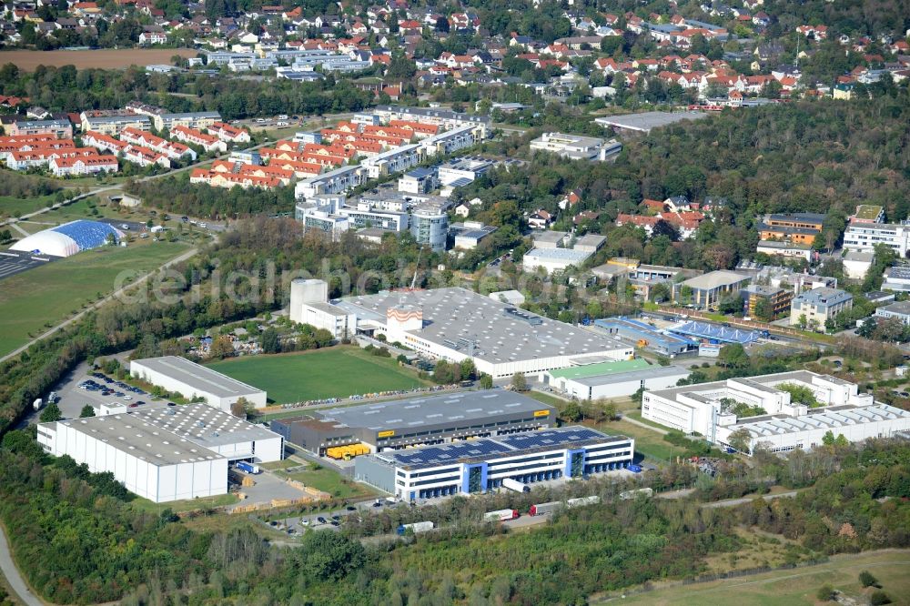 Aerial image Ottobrunn - Industrial estate and company settlement Gewerbegebiet Nord in Ottobrunn in the state of Bavaria. The settlement includes several office buildings and logistics centre as well as site of Deutsche Post