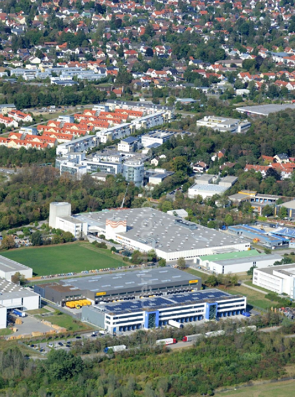 Ottobrunn from above - Industrial estate and company settlement Gewerbegebiet Nord in Ottobrunn in the state of Bavaria. The settlement includes several office buildings and logistics centre as well as site of Deutsche Post