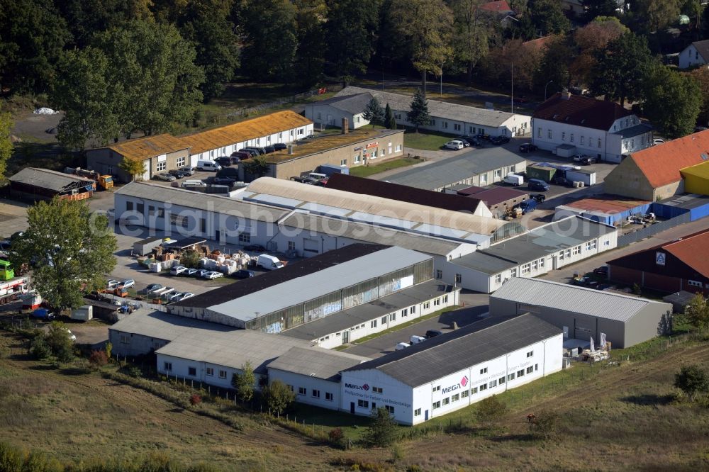 Oranienburg from the bird's eye view: Industrial estate and company settlement of the companies MEGA eG, Gewatech and also an ALDI-branch in Oranienburg in the state Brandenburg