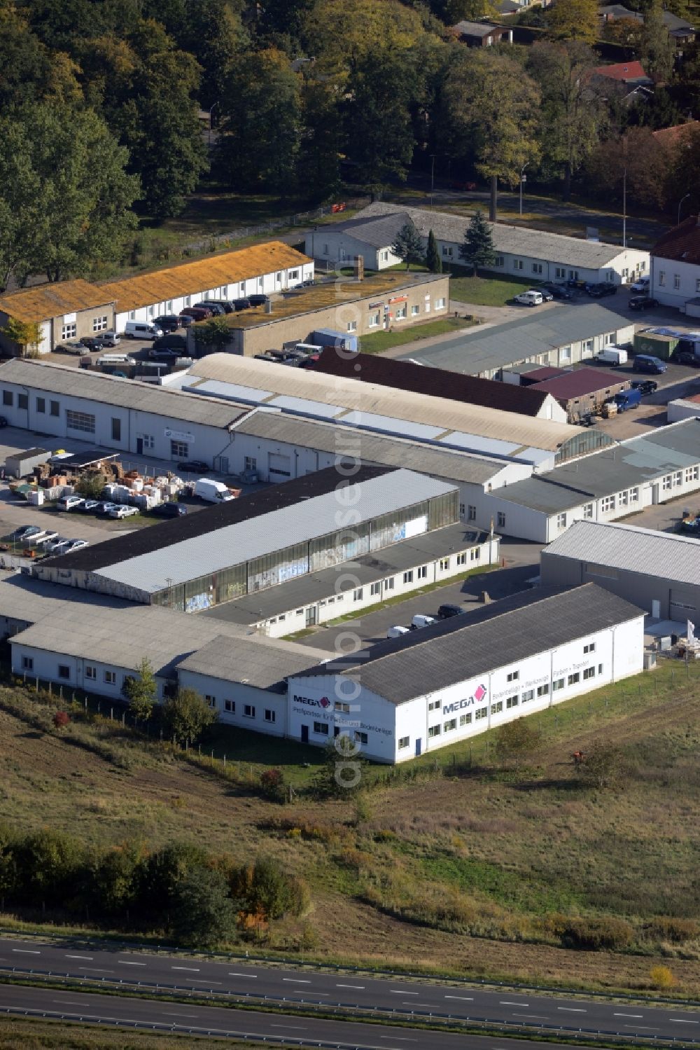 Aerial image Oranienburg - Industrial estate and company settlement of the companies MEGA eG, Gewatech and also an ALDI-branch in Oranienburg in the state Brandenburg