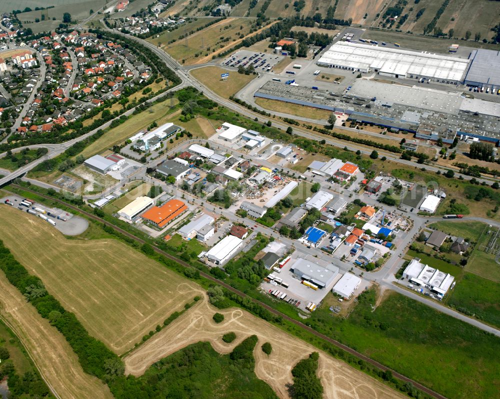 Philippsburg from the bird's eye view: Industrial estate and company settlement on street Bruchstuecker in the district Huttenheim in Philippsburg in the state Baden-Wuerttemberg, Germany