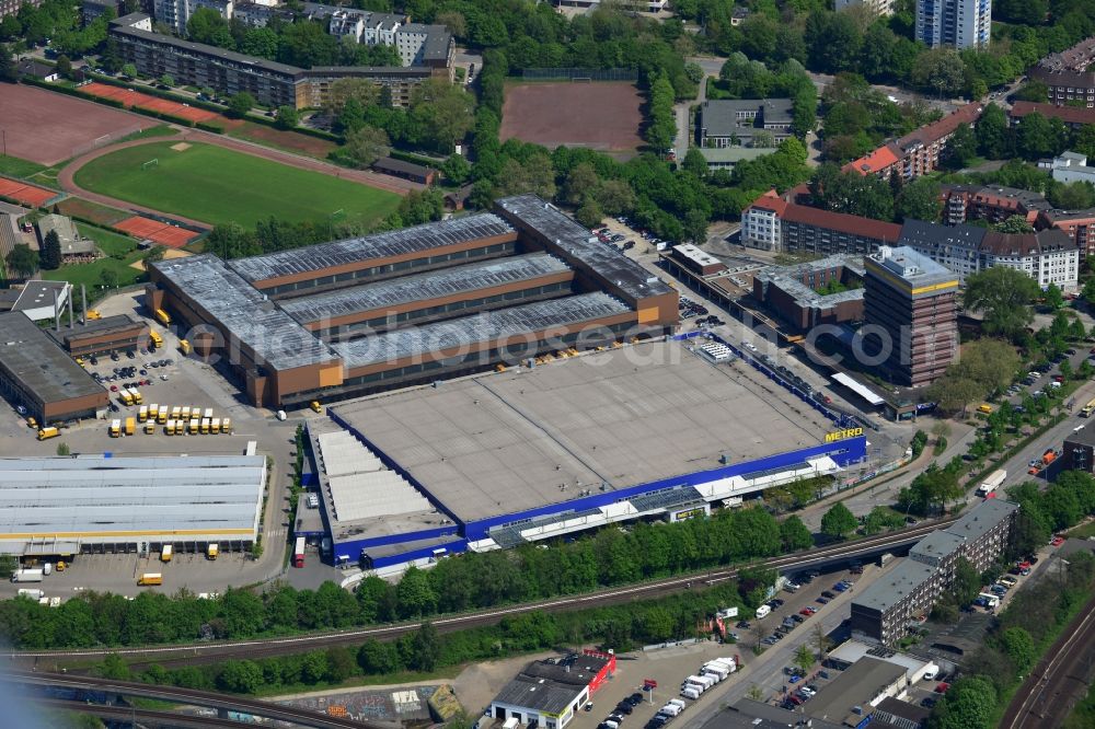 Hamburg from the bird's eye view: Commercial area Ploen Streaße / Stresemann Street shopping center with the Metro Group and logistics center of the German Post DHL in Hamburg