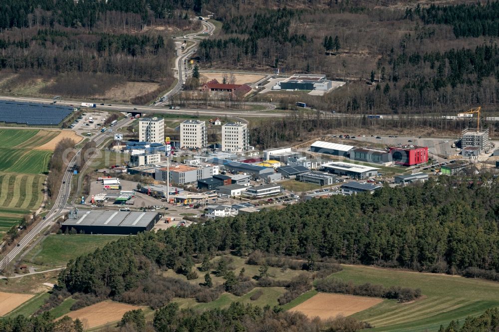 Heimsheim from the bird's eye view: Industrial estate and company settlement und Rastanlage on BAB A8 in Heimsheim in the state Baden-Wuerttemberg, Germany