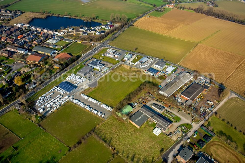 Rees from above - Industrial estate and company settlement on Rauhe Strasse on the Eastern edge of Rees in the state of North Rhine-Westphalia