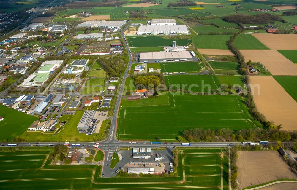 Rhynern from the bird's eye view: Industrial estate and company settlement with logistics centres of Hellweg and Friedrich Biermann Logistik und Spedition GmbH in Rhynern in the state of North Rhine-Westphalia