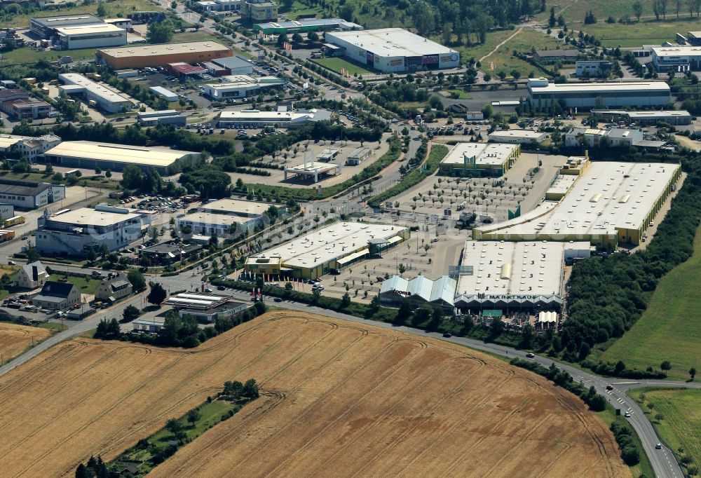 Saalfeld/Saale from the bird's eye view: In the industrial estate Rudolstaedter street in Saalfeld / Saale in Thuringia various supermarkets, furniture stores and retail facility such as Marktkauf, Danish bed warehouse and SB Furniture Boss have their branches