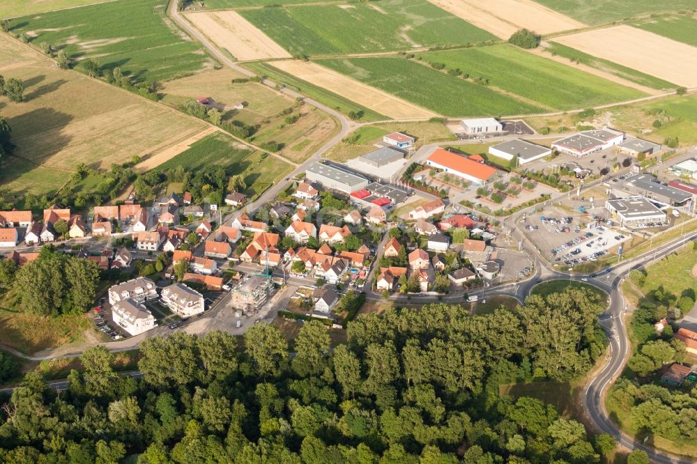 Oberhoffen-sur-Moder from the bird's eye view: Industrial estate and company settlement rue of Champs in Oberhoffen-sur-Moder in Grand Est, France