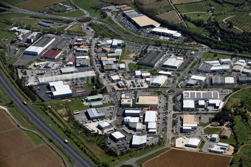 Clermont-l'Hérault from above - Industrial estate and company settlement on Rue du Servent in Clermont-l'Hérault in Languedoc-Roussillon Midi-Pyrenees, France