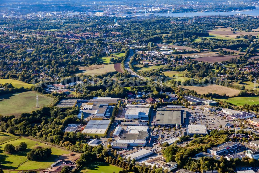 Aerial photograph Schwentinental - Industrial estate and company settlement rund um das Einkaufszentrum Baltic Center on street Liebigstrasse in Schwentinental in the state Schleswig-Holstein, Germany