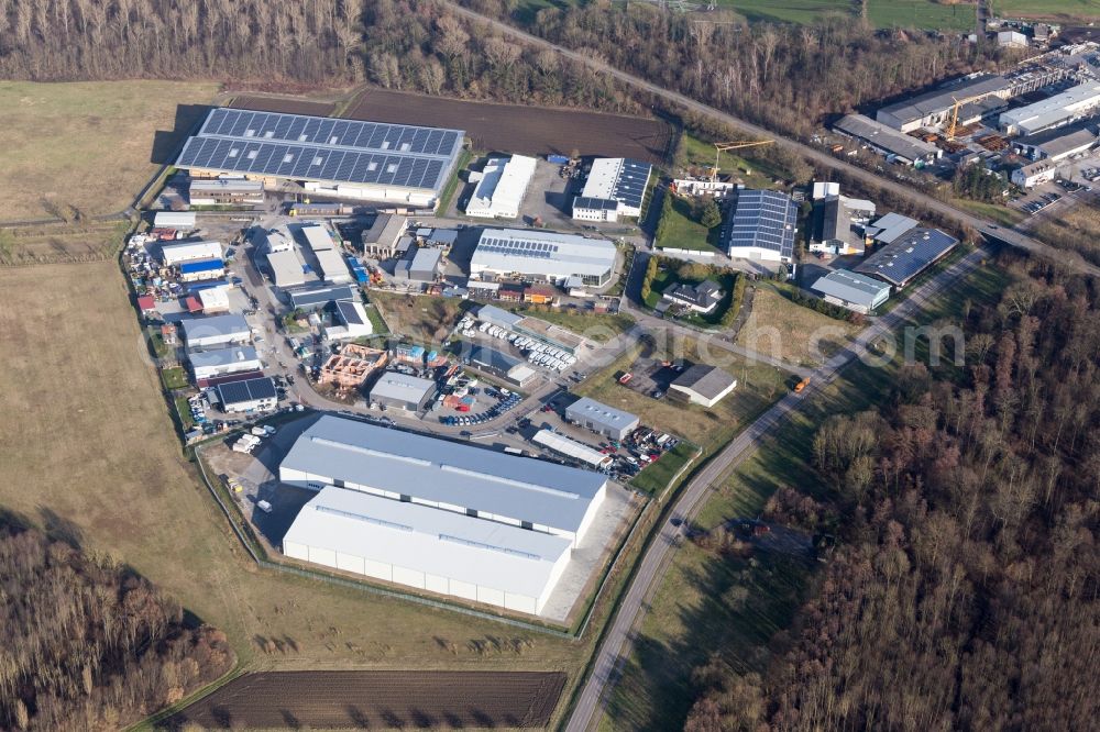 Aerial photograph Huttenheim - Industrial estate and company settlement Im Schorrenfeld in Huttenheim in the state Baden-Wurttemberg, Germany