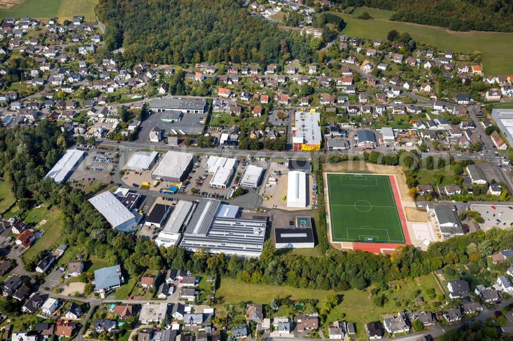 Aerial image Kreuztal - Industrial estate and company settlement and Sportplatz on Auwiese - Marburger Strasse in Kreuztal in the state North Rhine-Westphalia, Germany