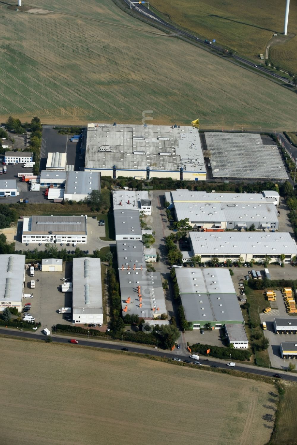 Aerial image Lindenberg - Industrial estate and company settlement an der Strasse Bucher Weg in Lindenberg in the state Brandenburg