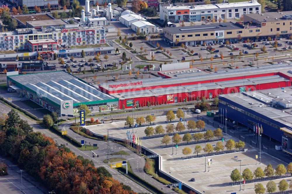 Brunnthal from above - Commercial site Taufkirchen near Munich in the state Bayern. In the image building of the companies Ikea, Hagebaumarkt, Metro