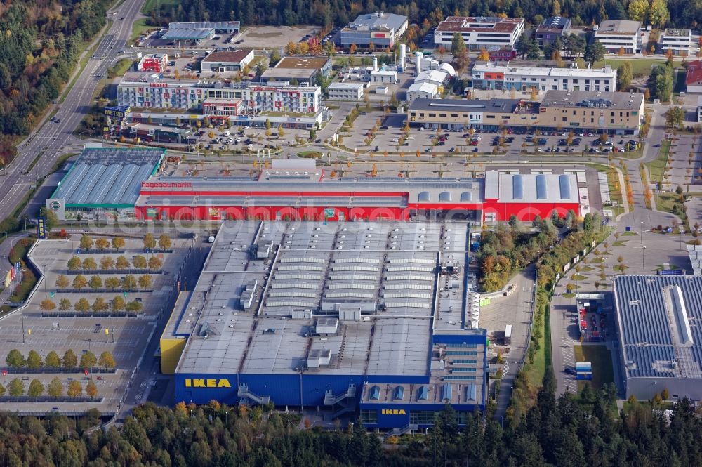 Brunnthal from the bird's eye view: Commercial site Taufkirchen near Munich in the state Bayern. In the image building of the companies Ikea, Hagebaumarkt, Metro