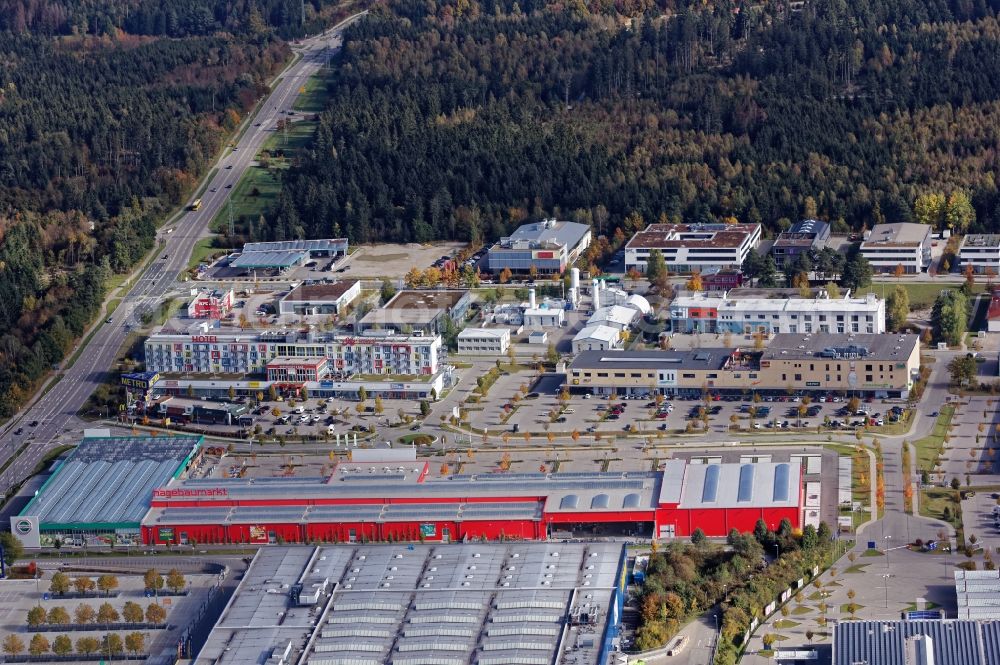 Aerial image Brunnthal - Commercial site Taufkirchen near Munich in the state Bayern. In the image building of the companies Ikea, Hagebaumarkt, Metro