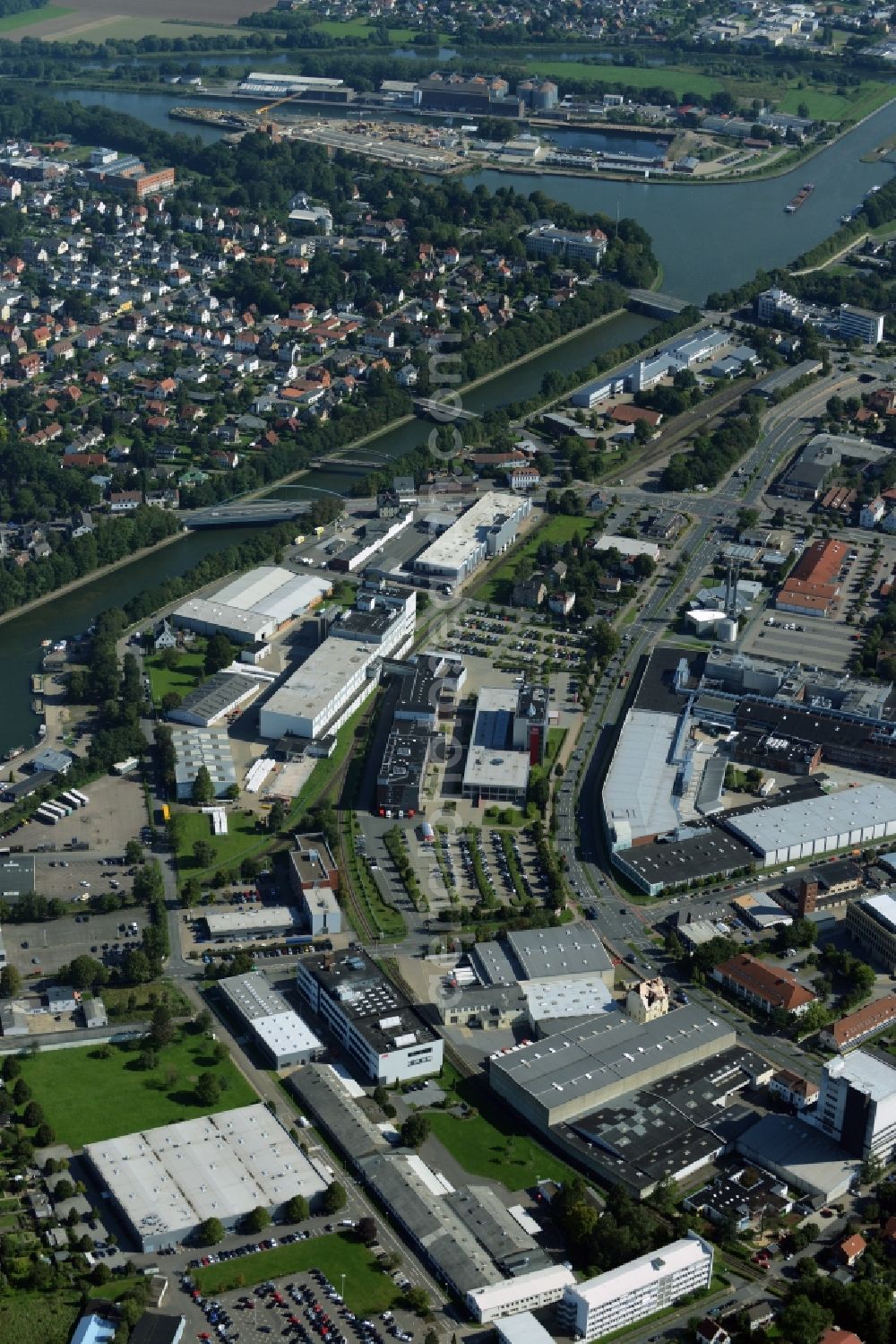 Minden from above - Industrial estate and company settlement on the riverbank of Mittelland Canal in Minden in the state of North Rhine-Westphalia