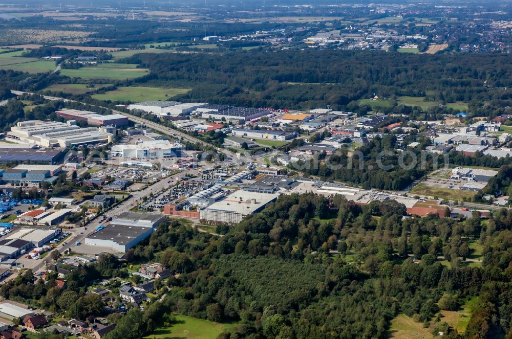 Flensburg from the bird's eye view: Commercial area west of the cemetery park Friedenshuegel in Flensburg in the state Schleswig-Holstein, Germany