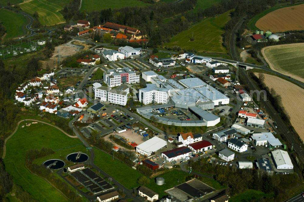 Aerial photograph Sailauf - Industrial estate and company settlement Weyberhoefe overlooking the building- ensemble of Magna International (Germany) GmbH and ACTS a?? Advanced Car Technology Systems GmbH & Co. KG on Kurfuerst-Eppstein-Ring in the district Weiberhof in Sailauf in the state Bavaria, Germany