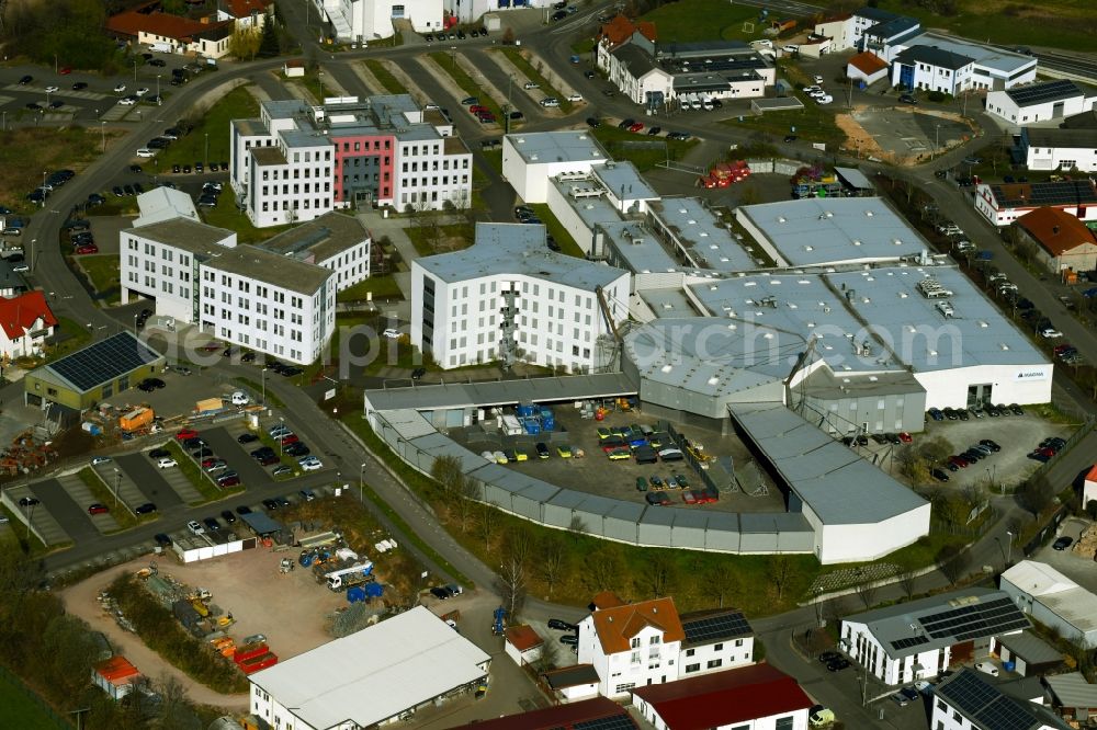 Sailauf from the bird's eye view: Industrial estate and company settlement Weyberhoefe overlooking the building- ensemble of Magna International (Germany) GmbH and ACTS a?? Advanced Car Technology Systems GmbH & Co. KG on Kurfuerst-Eppstein-Ring in the district Weiberhof in Sailauf in the state Bavaria, Germany