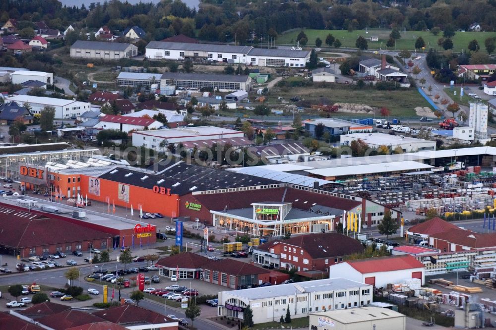 Waren (Müritz) from above - Industrial estate and company settlement on F.-Wilhelm-Raiffeisen-Strasse in Waren (Mueritz) in the state Mecklenburg - Western Pomerania, Germany