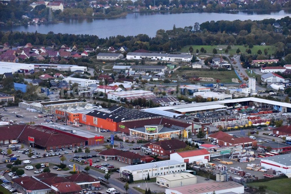 Waren (Müritz) from the bird's eye view: Industrial estate and company settlement on F.-Wilhelm-Raiffeisen-Strasse in Waren (Mueritz) in the state Mecklenburg - Western Pomerania, Germany