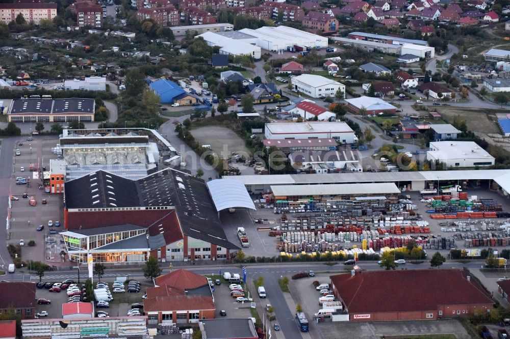 Aerial image Waren (Müritz) - Industrial estate and company settlement on F.-Wilhelm-Raiffeisen-Strasse in Waren (Mueritz) in the state Mecklenburg - Western Pomerania, Germany