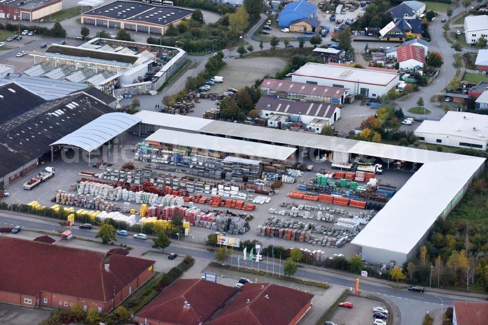 Waren (Müritz) from above - Industrial estate and company settlement on F.-Wilhelm-Raiffeisen-Strasse in Waren (Mueritz) in the state Mecklenburg - Western Pomerania, Germany