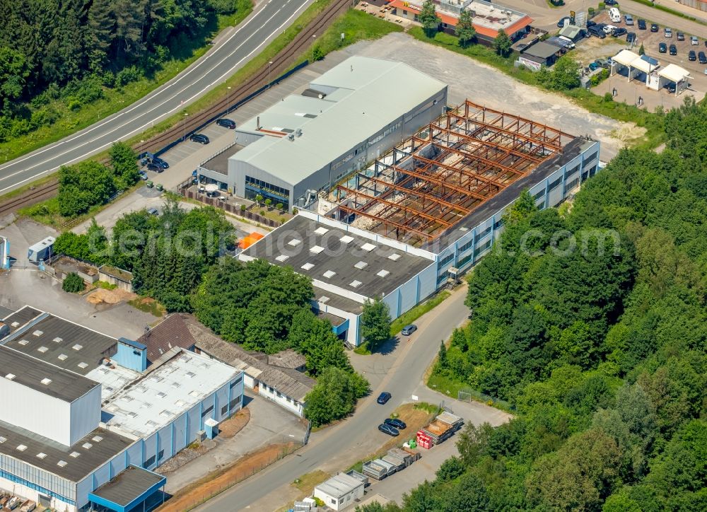 Warstein from the bird's eye view: Industrial estate and company settlement Zum Puddelhammer in Warstein in the state North Rhine-Westphalia