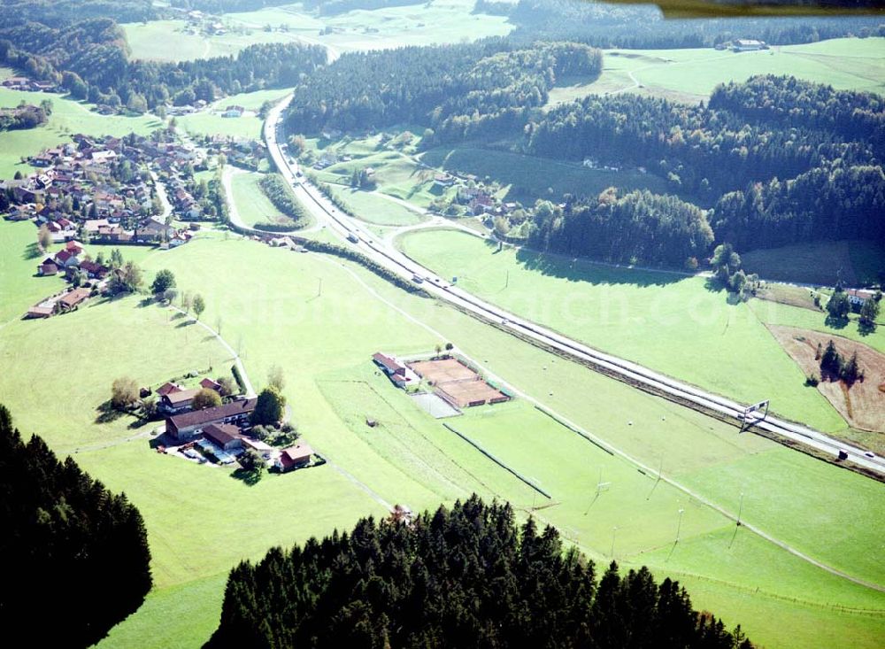 Neukirchen / Bayern from the bird's eye view: Gewerbegrundstück Neukirchen der Unternehmensgruppe MAX AICHER an der Autobahn nach Salzburg westl. von Freilassing.