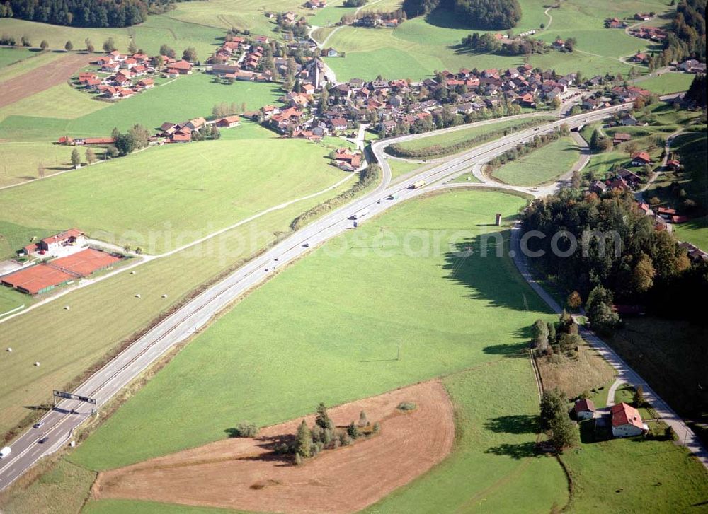 Aerial photograph Neukirchen / Bayern - Gewerbegrundstück Neukirchen der Unternehmensgruppe MAX AICHER an der Autobahn nach Salzburg westl. von Freilassing.