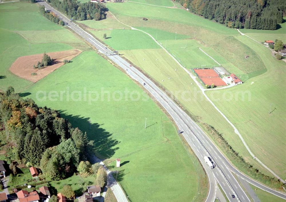 Neukirchen / Bayern from the bird's eye view: Gewerbegrundstück Neukirchen der Unternehmensgruppe MAX AICHER an der Autobahn nach Salzburg westl. von Freilassing.