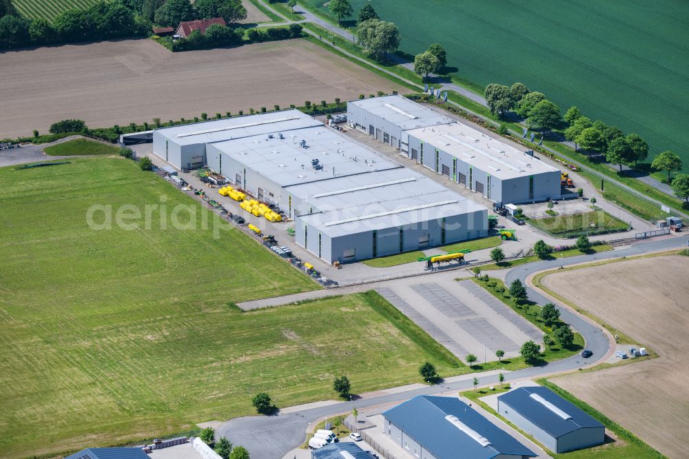 Buxtehude from the bird's eye view: Commercial buildings HERBERT DAMMANN GmbH Hedendorf Neukloster in Buxtehude in the state Lower Saxony, Germany