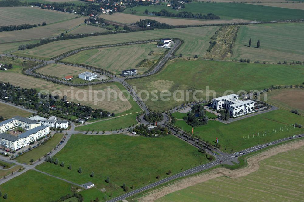 Aerial photograph Großkugel - Der Gewerbepark Großkugel bietet mehr als nur Gewerbegrundstücke. Flexible Grundstücksgrößen, bedarfsgerechten Zuschnitt der Grundstücke, ebene Lage, sofortige Bebaubarkeit. Das alles in der Nähe des Flughafens Leipzig-Halle, der Autobahn A9 (Nürnberg - Berlin) und der Bundesstraße B6. Ein sehr guter Standort für Industrie-, Gewerbe- und Büroansiedlung. Ein Projekt der HVB-Immobilien AG.