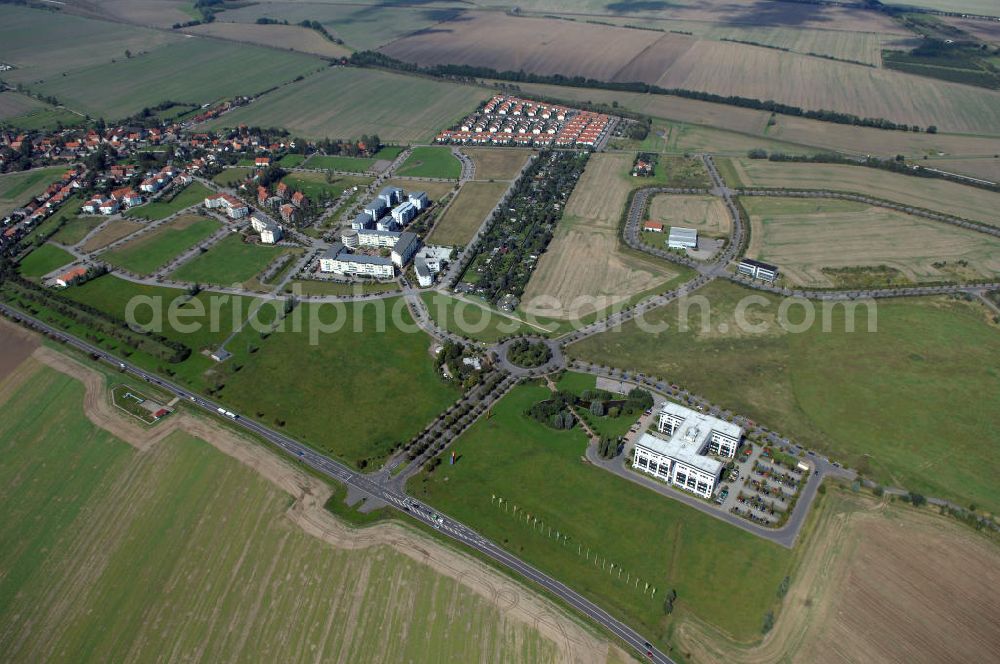 Aerial photograph Großkugel - Der Gewerbepark Großkugel bietet mehr als nur Gewerbegrundstücke. Flexible Grundstücksgrößen, bedarfsgerechten Zuschnitt der Grundstücke, ebene Lage, sofortige Bebaubarkeit. Das alles in der Nähe des Flughafens Leipzig-Halle, der Autobahn A9 (Nürnberg - Berlin) und der Bundesstraße B6. Ein sehr guter Standort für Industrie-, Gewerbe- und Büroansiedlung. Ein Projekt der HVB-Immobilien AG.