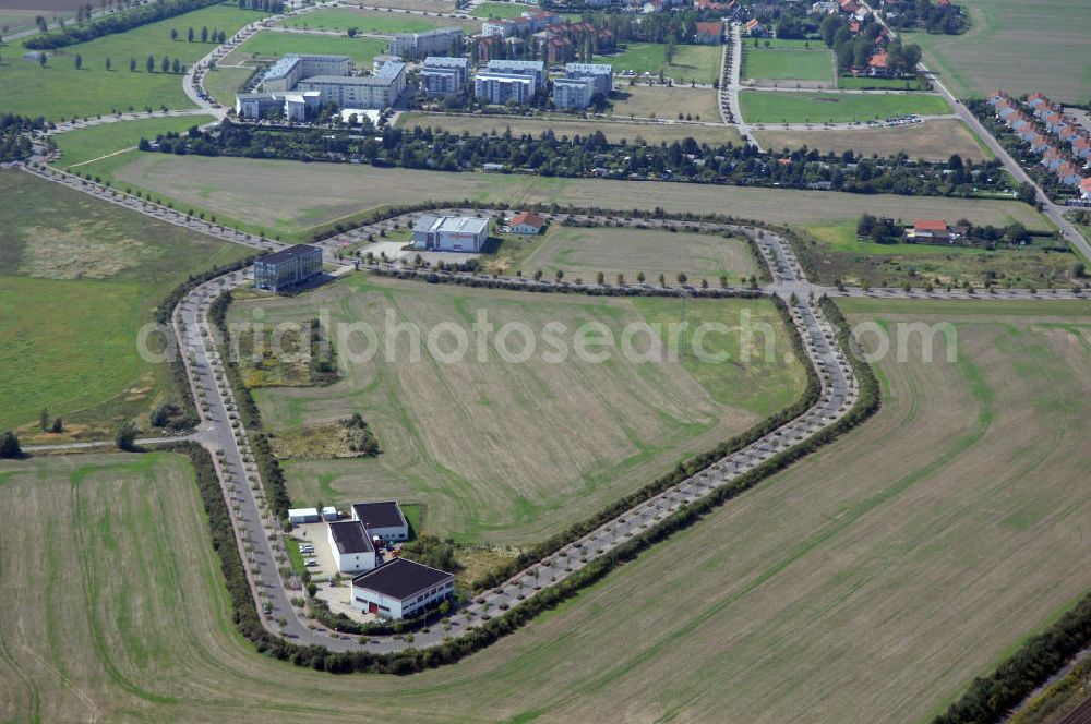 Aerial photograph Großkugel - Der Gewerbepark Großkugel bietet mehr als nur Gewerbegrundstücke. Flexible Grundstücksgrößen, bedarfsgerechten Zuschnitt der Grundstücke, ebene Lage, sofortige Bebaubarkeit. Das alles in der Nähe des Flughafens Leipzig-Halle, der Autobahn A9 (Nürnberg - Berlin) und der Bundesstraße B6. Ein sehr guter Standort für Industrie-, Gewerbe- und Büroansiedlung. Ein Projekt der HVB-Immobilien AG.