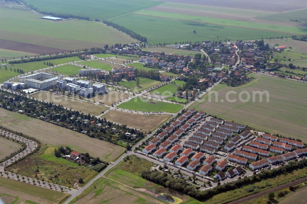 Aerial photograph Großkugel - Der Gewerbepark Großkugel bietet mehr als nur Gewerbegrundstücke. Flexible Grundstücksgrößen, bedarfsgerechten Zuschnitt der Grundstücke, ebene Lage, sofortige Bebaubarkeit. Das alles in der Nähe des Flughafens Leipzig-Halle, der Autobahn A9 (Nürnberg - Berlin) und der Bundesstraße B6. Ein sehr guter Standort für Industrie-, Gewerbe- und Büroansiedlung. Ein Projekt der HVB-Immobilien AG.