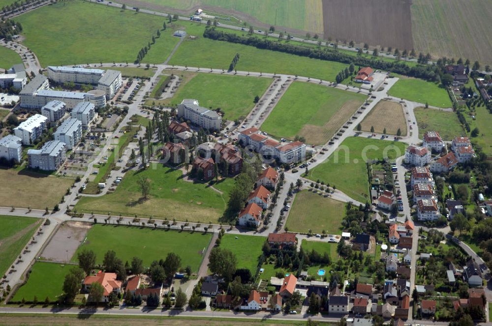 Aerial photograph Großkugel - Der Gewerbepark Großkugel bietet mehr als nur Gewerbegrundstücke. Flexible Grundstücksgrößen, bedarfsgerechten Zuschnitt der Grundstücke, ebene Lage, sofortige Bebaubarkeit. Das alles in der Nähe des Flughafens Leipzig-Halle, der Autobahn A9 (Nürnberg - Berlin) und der Bundesstraße B6. Ein sehr guter Standort für Industrie-, Gewerbe- und Büroansiedlung. Ein Projekt der HVB-Immobilien AG.