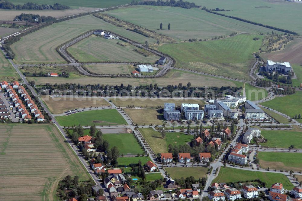 Aerial photograph Großkugel - Der Gewerbepark Großkugel bietet mehr als nur Gewerbegrundstücke. Flexible Grundstücksgrößen, bedarfsgerechten Zuschnitt der Grundstücke, ebene Lage, sofortige Bebaubarkeit. Das alles in der Nähe des Flughafens Leipzig-Halle, der Autobahn A9 (Nürnberg - Berlin) und der Bundesstraße B6. Ein sehr guter Standort für Industrie-, Gewerbe- und Büroansiedlung. Ein Projekt der HVB-Immobilien AG.