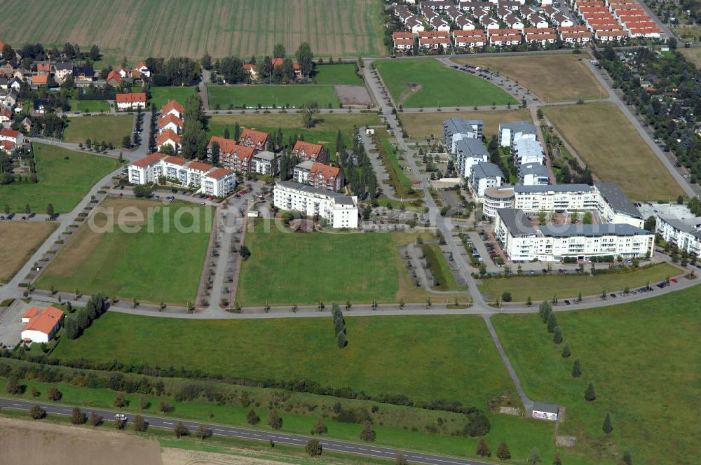 Aerial photograph Großkugel - Der Gewerbepark Großkugel bietet mehr als nur Gewerbegrundstücke. Flexible Grundstücksgrößen, bedarfsgerechten Zuschnitt der Grundstücke, ebene Lage, sofortige Bebaubarkeit. Das alles in der Nähe des Flughafens Leipzig-Halle, der Autobahn A9 (Nürnberg - Berlin) und der Bundesstraße B6. Ein sehr guter Standort für Industrie-, Gewerbe- und Büroansiedlung. Ein Projekt der HVB-Immobilien AG.