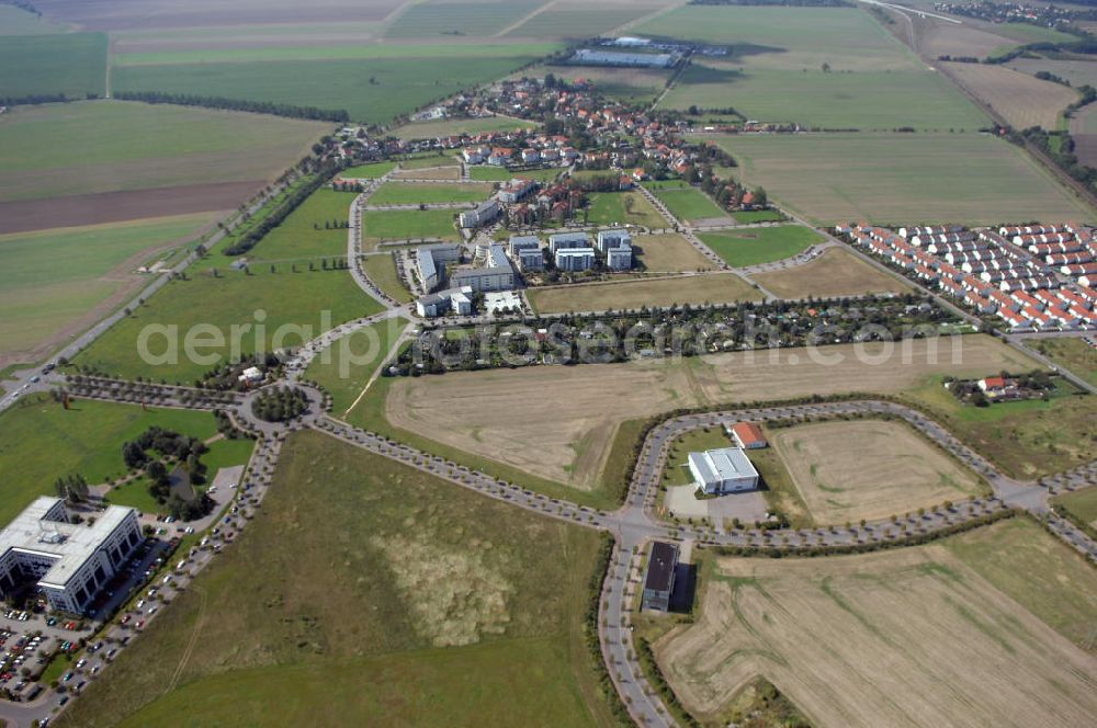 Aerial photograph Großkugel - Der Gewerbepark Großkugel bietet mehr als nur Gewerbegrundstücke. Flexible Grundstücksgrößen, bedarfsgerechten Zuschnitt der Grundstücke, ebene Lage, sofortige Bebaubarkeit. Das alles in der Nähe des Flughafens Leipzig-Halle, der Autobahn A9 (Nürnberg - Berlin) und der Bundesstraße B6. Ein sehr guter Standort für Industrie-, Gewerbe- und Büroansiedlung. Ein Projekt der HVB-Immobilien AG.