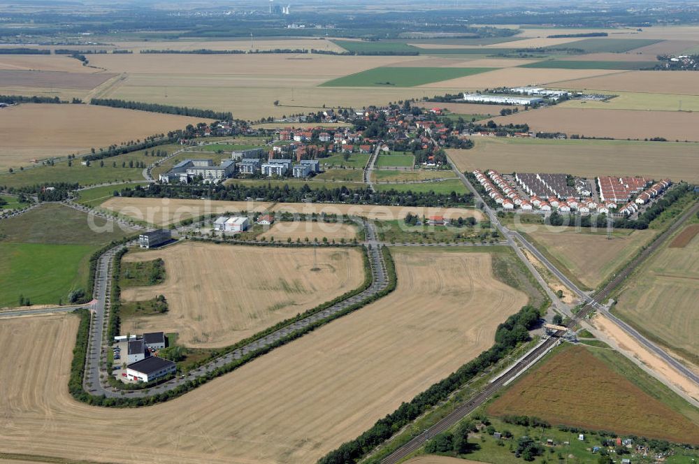 Aerial photograph Großkugel - Der Gewerbepark Großkugel bietet mehr als nur Gewerbegrundstücke. Flexible Grundstücksgrößen, bedarfsgerechten Zuschnitt der Grundstücke, ebene Lage, sofortige Bebaubarkeit. Das alles in der Nähe des Flughafens Leipzig-Halle, der Autobahn A9 (Nürnberg - Berlin) und der Bundesstraße B6. Ein sehr guter Standort für Industrie-, Gewerbe- und Büroansiedlung. Ein Projekt der HVB-Immobilien AG.