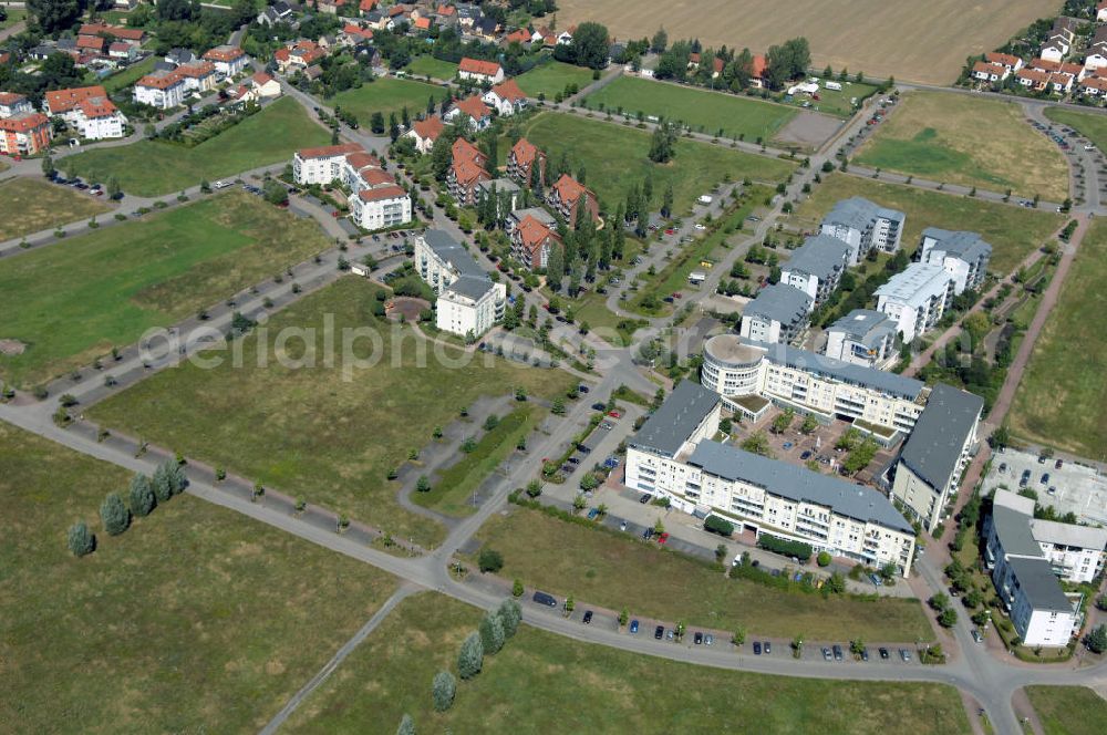 Aerial photograph Großkugel - Der Gewerbepark Großkugel bietet mehr als nur Gewerbegrundstücke. Flexible Grundstücksgrößen, bedarfsgerechten Zuschnitt der Grundstücke, ebene Lage, sofortige Bebaubarkeit. Das alles in der Nähe des Flughafens Leipzig-Halle, der Autobahn A9 (Nürnberg - Berlin) und der Bundesstraße B6. Ein sehr guter Standort für Industrie-, Gewerbe- und Büroansiedlung. Ein Projekt der HVB-Immobilien AG.