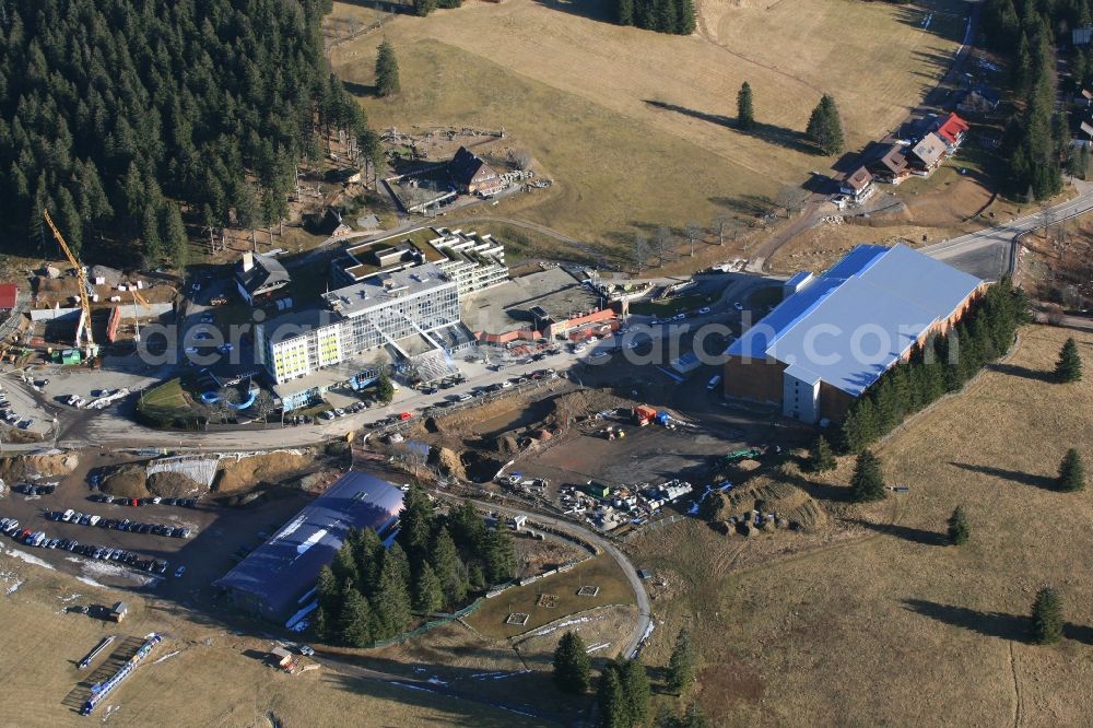 Feldberg (Schwarzwald) from above - Almost without snow is the summit region of the highest mountain in the Black Forest, the Feldberg in Feldberg (Schwarzwald) in Baden-Wuerttemberg. In time for the winter season and the Christmas holidays the car park has been finished on the Seebuck. But there is no snow for winter sports