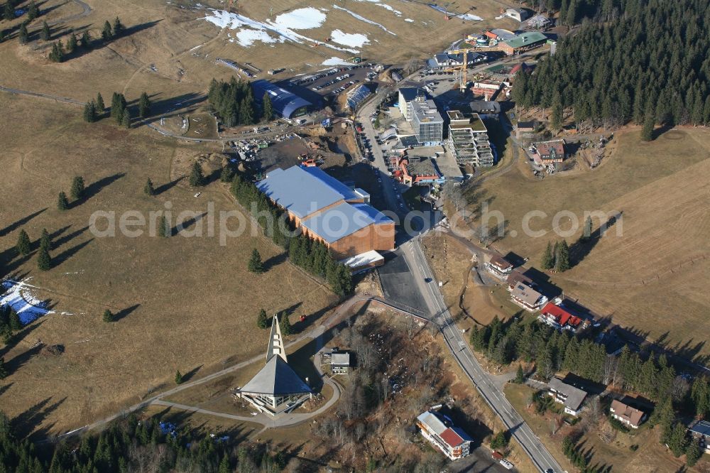 Aerial image Feldberg (Schwarzwald) - Almost without snow is the summit region of the highest mountain in the Black Forest, the Feldberg in Feldberg (Schwarzwald) in Baden-Wuerttemberg. In time for the winter season and the Christmas holidays the car park has been finished on the Seebuck. But there is no snow for winter sports