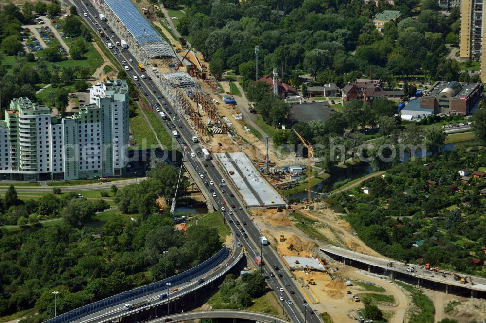 Aerial image Warschau - View of the glass roof mounting for expansion of the expressway Trasa Armii Krajowej in Warsaw in Poland