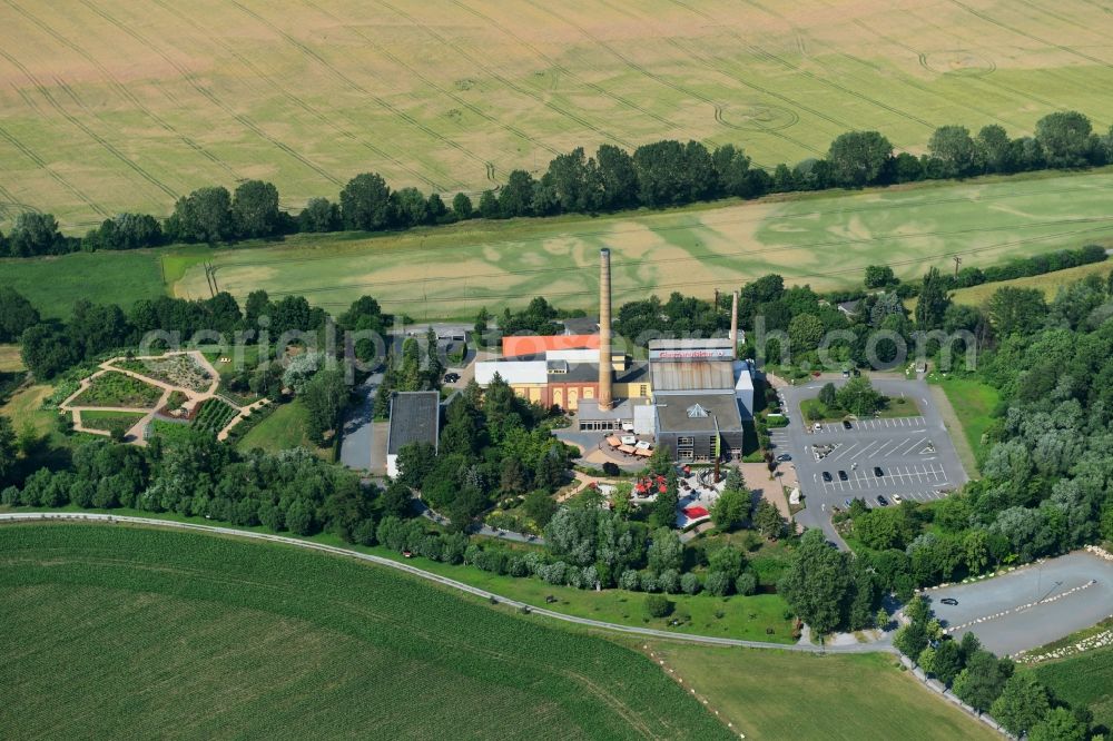 Aerial image Derenburg - Building and production halls on the premises of Glasmanufaktur Harzkristall GmbH Im Freien Felde in Derenburg in the state Saxony-Anhalt, Germany