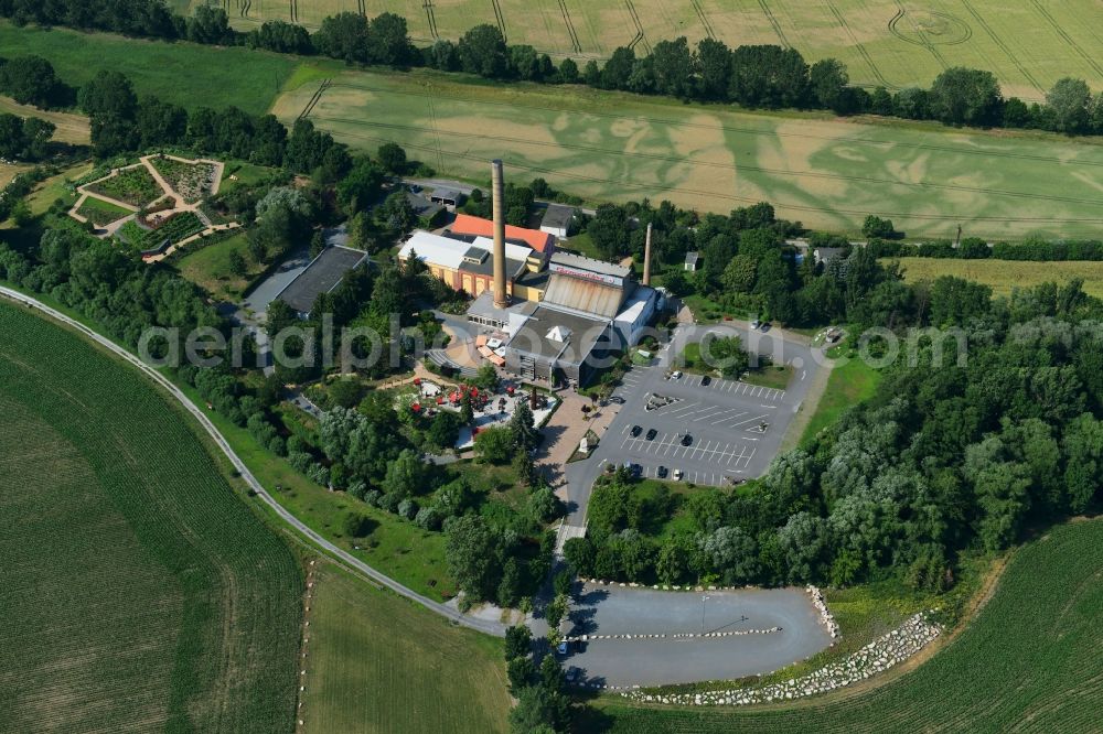 Derenburg from above - Building and production halls on the premises of Glasmanufaktur Harzkristall GmbH Im Freien Felde in Derenburg in the state Saxony-Anhalt, Germany