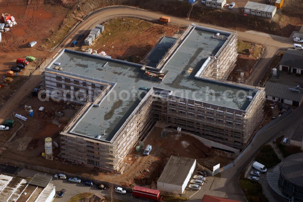 Aerial photograph Glauchau - Blick auf die Erweiterungsbaustelle des Kreiskrankenhaus Rudolf Virchow. Der Rohbau wurde von der Firma Riedel Bau ausgeführt. Kontakt: Firmengruppe Riedel Bau, Silbersteinstraße 4, 97424 Schweinfurt, Tel. 09721 676-0, Fax 09721 676-110, E-Mail info@riedelbau.de,