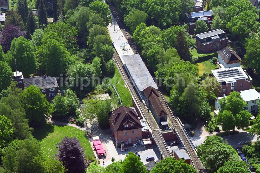 Aerial image Hamburg - Station railway building of the Deutsche Bahn on street Alte Dorfstrasse in the district Ohlstedt in Hamburg, Germany